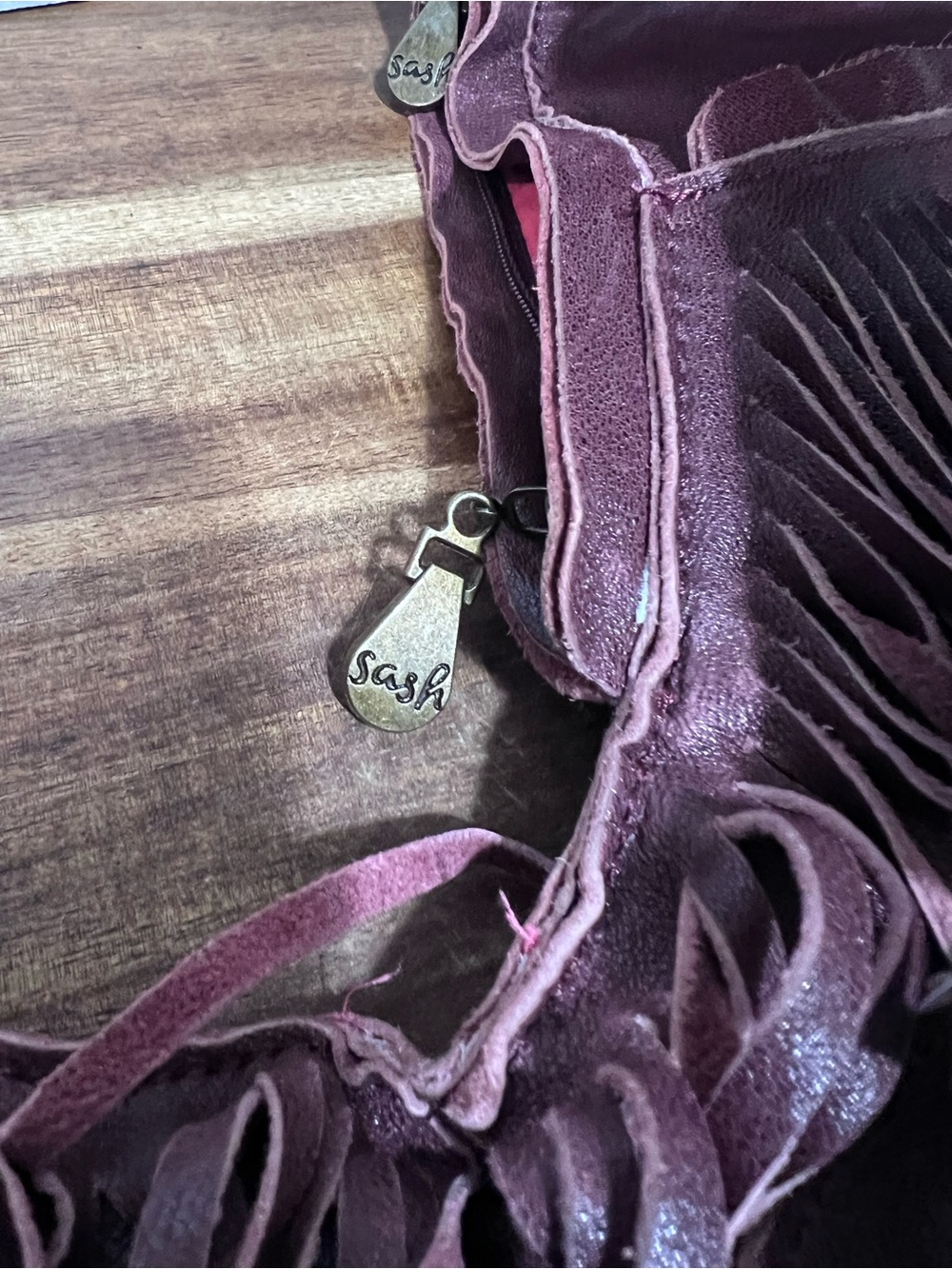 Sash Bag leather fringe crossbody bag in a rich merlot shade, featuring a distin - Picture 3 of 6